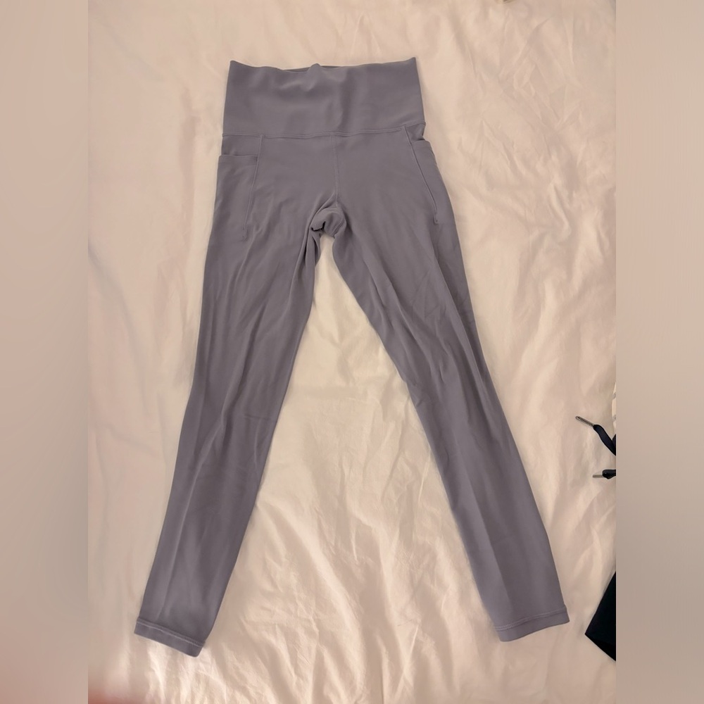 Athleta Salutation Stash Pocket II 7/8 Tight